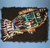 Lesson 5 photo: a figure of a fish, made of pieces of marine debris